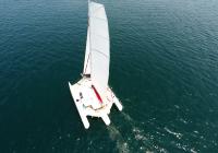 trimaran from above mast main sail flatten